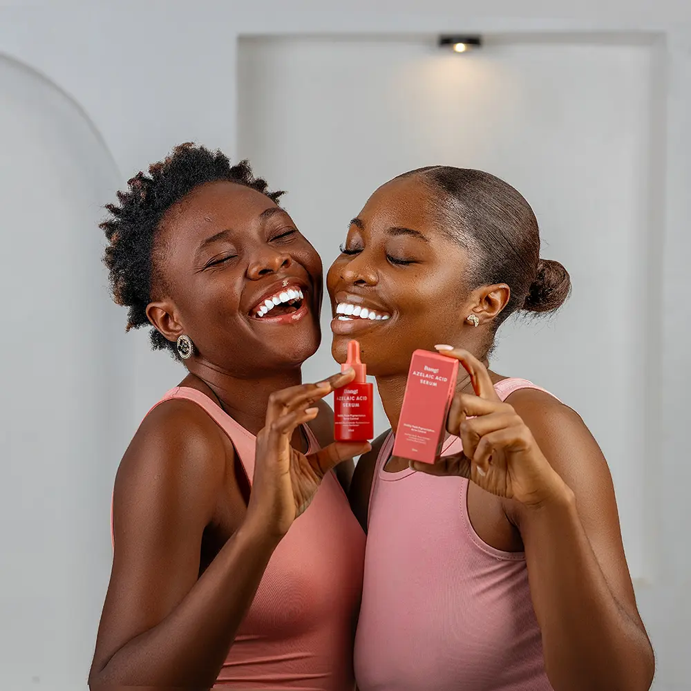 2 models holding a bottle of azelaic acid serums,